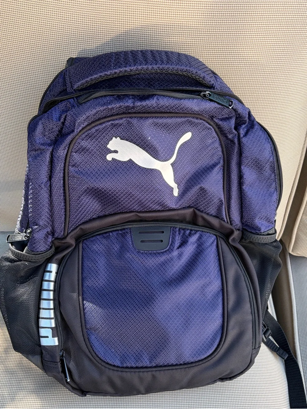 Puma Purple and Black Sports Backpack with White Logo